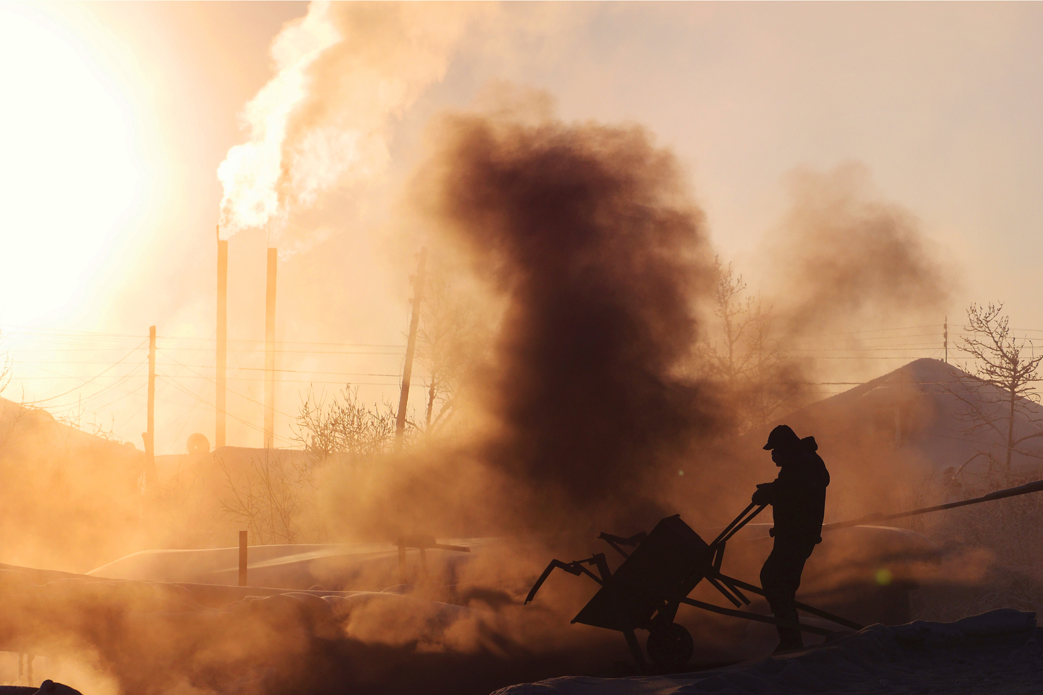 Man working in a coal plant