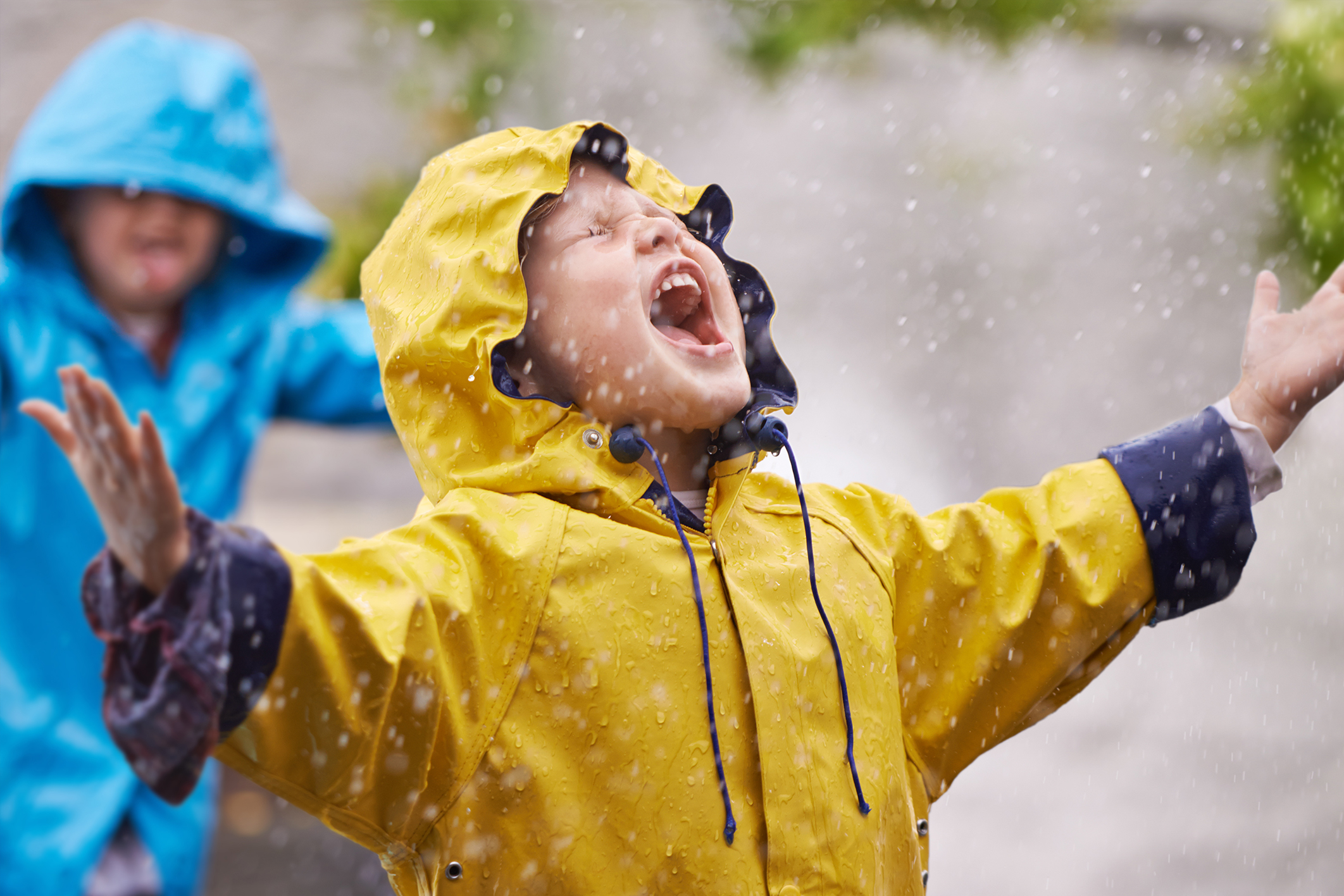 Children playing in rain